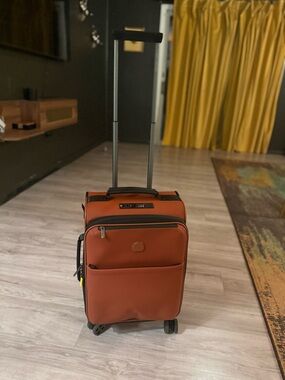Delsey Paris Orange Carry-On Spinner Luggage - Telescoping Handle